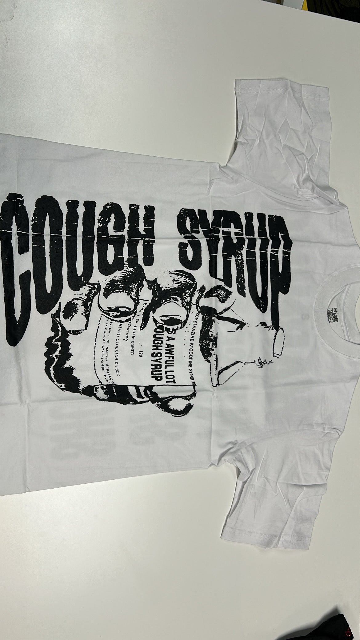 Thats a awful lot of cough syrup - white faded print